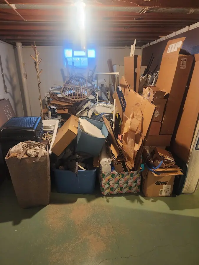 Roll-off dumpster container at job site for 2 Yard Dumpster Rental in Upper Macungie