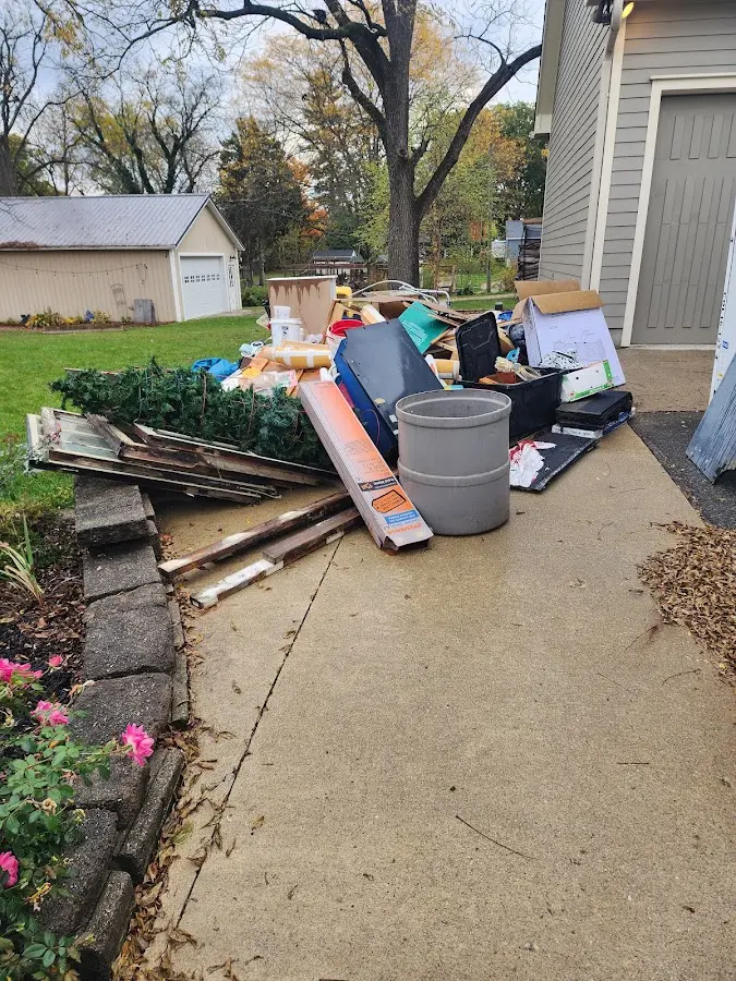 Dumpster being loaded with debris for 30 Yard Dumpster Rental in Upper Macungie